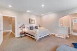 Upstairs master bedroom with king bed at Puffins Place
